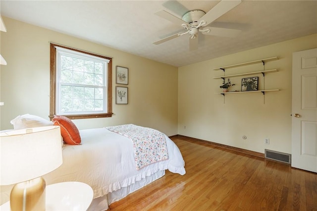 326 Cheese Factory Rd, Mendon, NY 14472 - bedroom featuring wood finished floors and a ceiling fan
