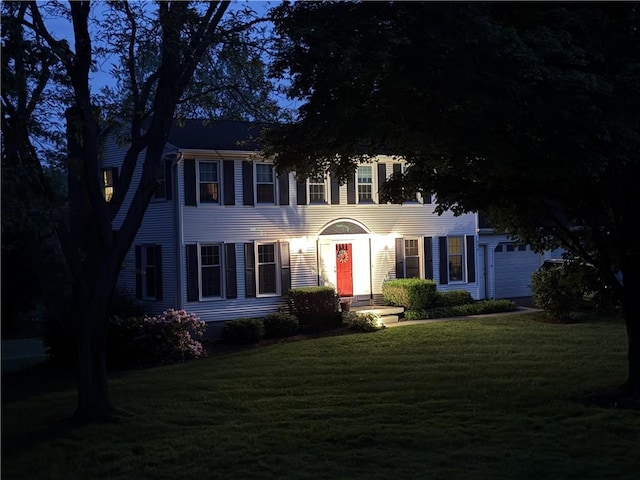 326 Cheese Factory Rd, Mendon, NY 14472 - colonial home with a front lawn and an attached garage