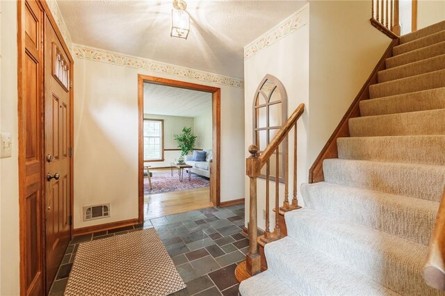 326 Cheese Factory Rd, Mendon, NY 14472 - foyer entrance with stone tile flooring and stairway