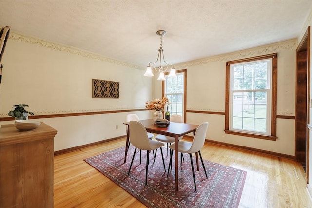 326 Cheese Factory Rd, Mendon, NY 14472 - dining room with light wood finished floors and baseboards
