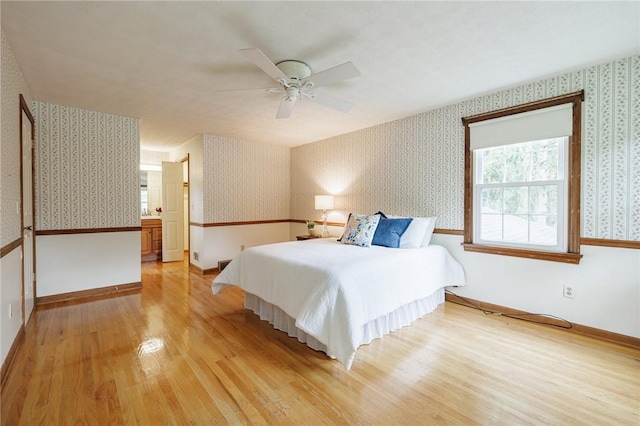 326 Cheese Factory Rd, Mendon, NY 14472 - bedroom with wallpapered walls, light wood-style flooring, and ceiling fan