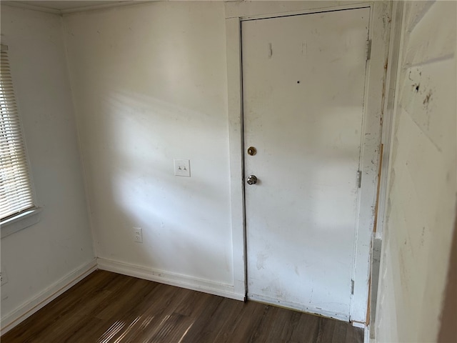 472 Seneca Rd, Irondequoit, NY 14622 - unfurnished room with dark wood-type flooring and baseboards