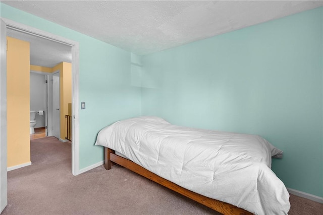 1521 Aster Ter, Walworth, NY 14568 - carpeted bedroom with baseboards and a textured ceiling