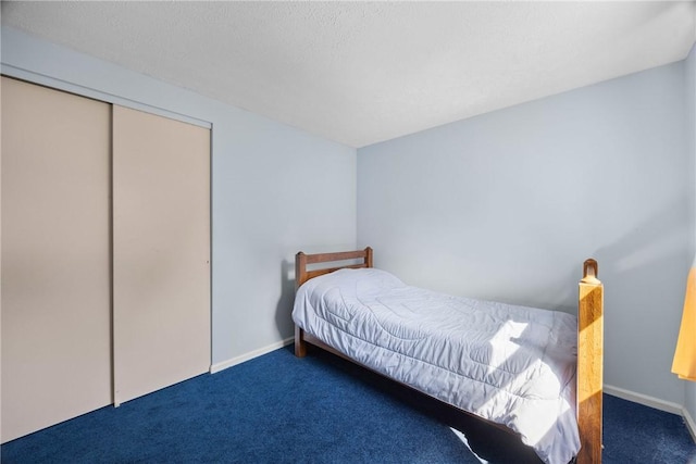 1521 Aster Ter, Walworth, NY 14568 - carpeted bedroom featuring a closet and baseboards