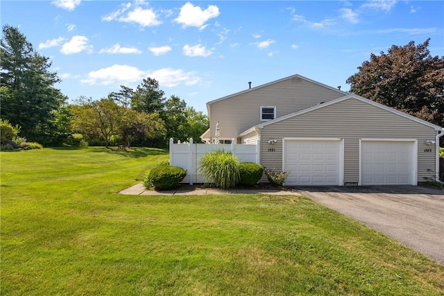 1521 Aster Ter, Walworth, NY 14568 - view of side of home with asphalt driveway and an attached garage