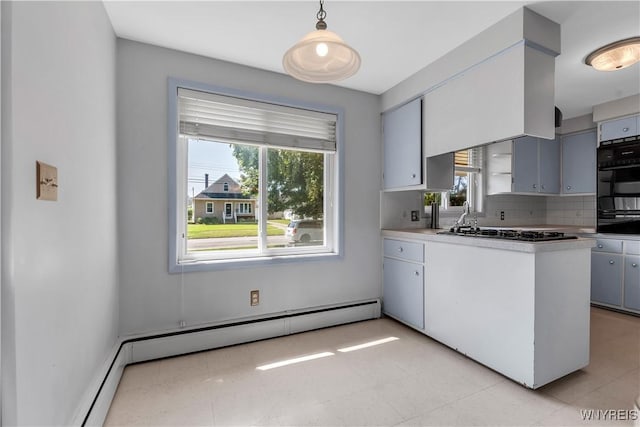 566 Adam St, Tonawanda, NY 14150 - kitchen with oven, gas stovetop, tasteful backsplash, a peninsula, and pendant lighting