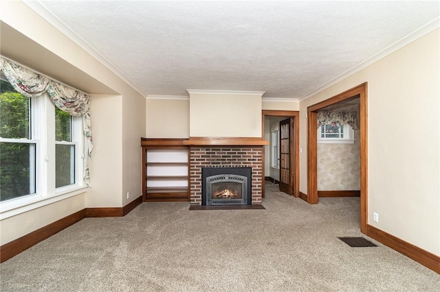 23 Hathaway Rd, Irondequoit, NY 14617 - unfurnished living room with carpet floors, plenty of natural light, a brick fireplace, crown molding, and a textured ceiling