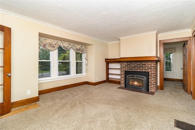 23 Hathaway Rd, Irondequoit, NY 14617 - unfurnished living room with carpet flooring, ornamental molding, a brick fireplace, and a textured ceiling