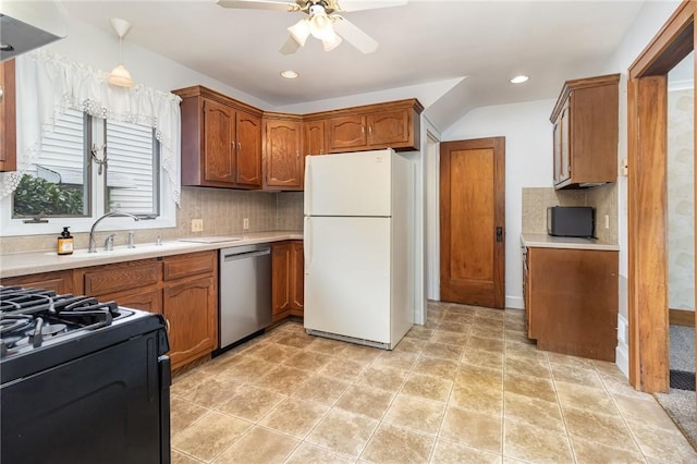 23 Hathaway Rd, Irondequoit, NY 14617 - kitchen with freestanding refrigerator, stainless steel dishwasher, black range with gas cooktop, light countertops, and ceiling fan