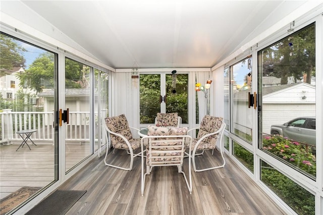 23 Hathaway Rd, Irondequoit, NY 14617 - sunroom / solarium featuring vaulted ceiling and outdoor dining space