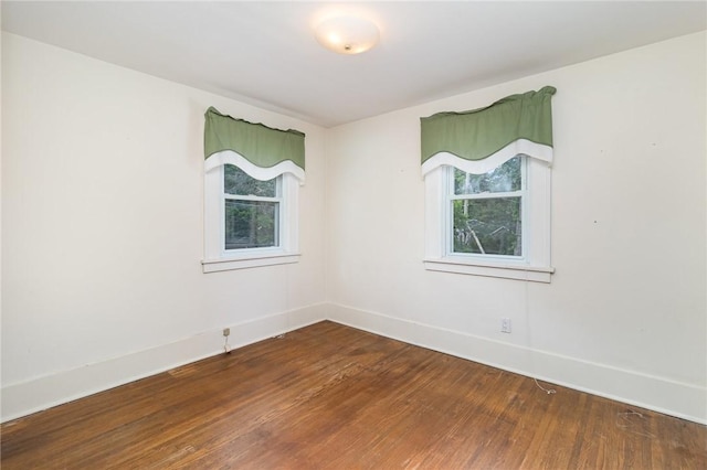 23 Hathaway Rd, Irondequoit, NY 14617 - spare room featuring wood finished floors and plenty of natural light