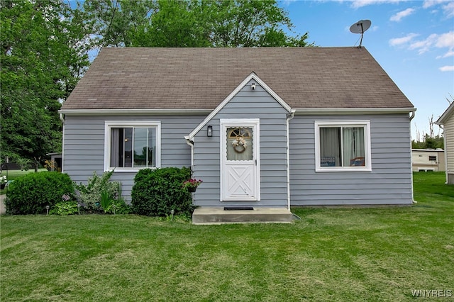 3029 Stieg Rd, Wheatfield, NY 14120 - view of front of home with a front lawn and a shingled roof