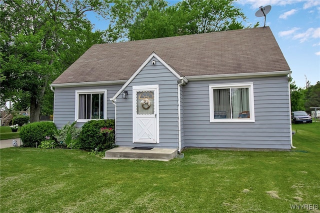3029 Stieg Rd, Wheatfield, NY 14120 - view of front facade featuring a front lawn and roof with shingles