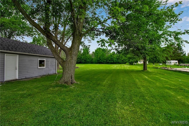 3029 Stieg Rd, Wheatfield, NY 14120 - view of grassy yard with an outdoor structure