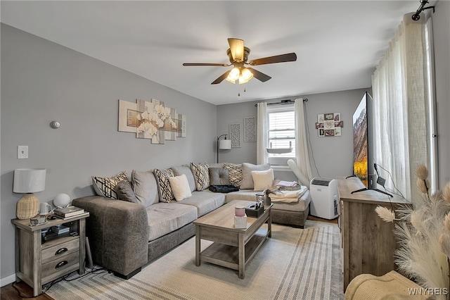 3029 Stieg Rd, Wheatfield, NY 14120 - living room with a ceiling fan and light wood-style floors