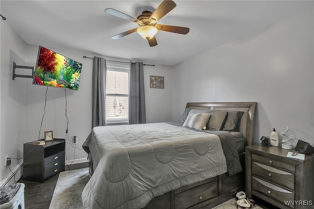 3029 Stieg Rd, Wheatfield, NY 14120 - bedroom with wood finished floors, ceiling fan, and a baseboard heating unit