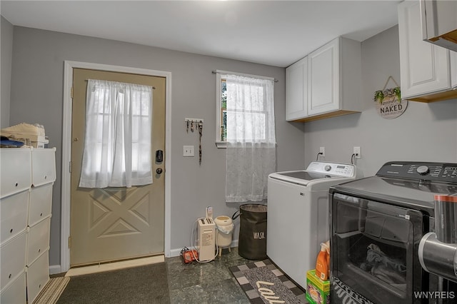 3029 Stieg Rd, Wheatfield, NY 14120 - laundry area with cabinet space and washer and dryer