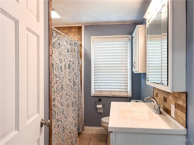 9 Curtis Ave, Lysander, NY 13027 - bathroom with vanity, tile patterned floors, a textured ceiling, tasteful backsplash, and curtained shower