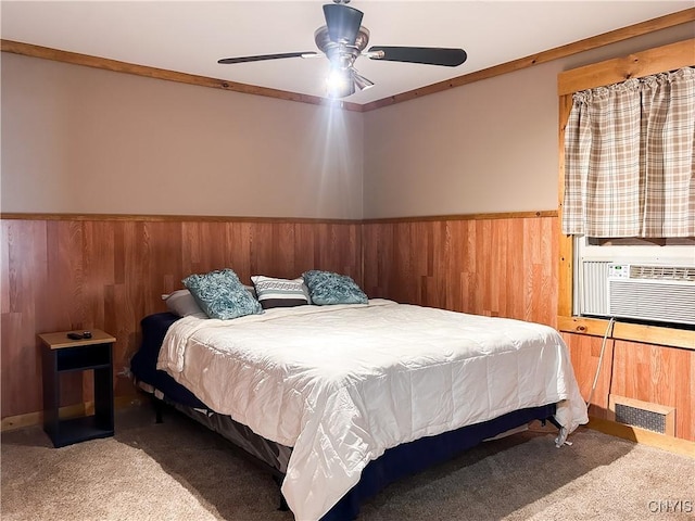 9 Curtis Ave, Lysander, NY 13027 - carpeted bedroom with wood walls, a wainscoted wall, ceiling fan, and cooling unit