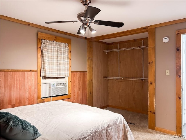 9 Curtis Ave, Lysander, NY 13027 - bedroom featuring a closet, wooden walls, carpet, cooling unit, and a wainscoted wall