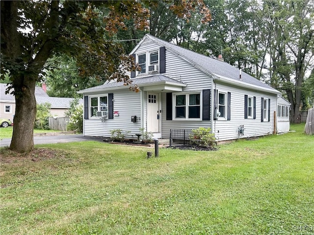 9 Curtis Ave, Lysander, NY 13027 - bungalow-style home featuring a shingled roof, driveway, and cooling unit