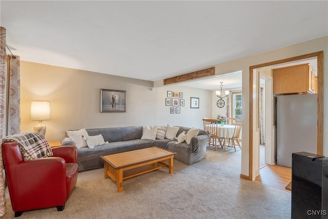 22 Tree Line Dr, Clay, NY 13090 - living room with light carpet and a chandelier