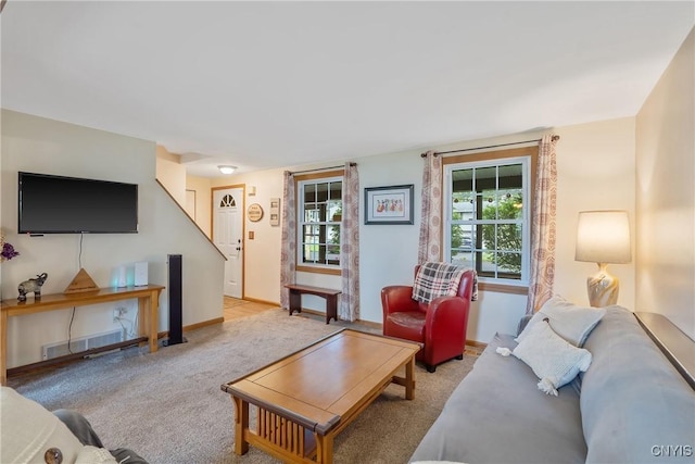 22 Tree Line Dr, Clay, NY 13090 - living room featuring light colored carpet and stairs