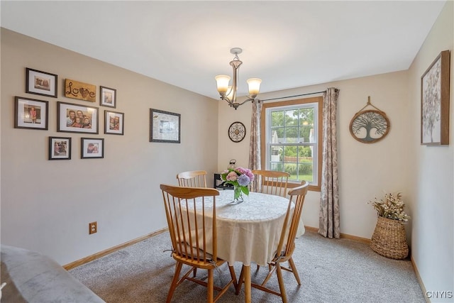 22 Tree Line Dr, Clay, NY 13090 - dining area with light colored carpet and a chandelier