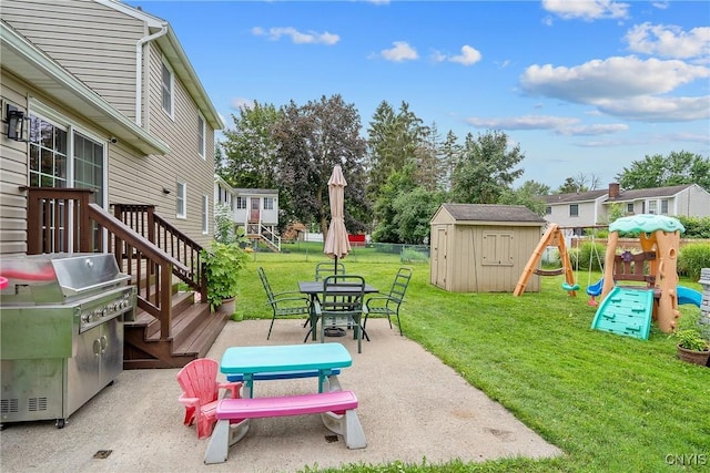 22 Tree Line Dr, Clay, NY 13090 - view of yard featuring a shed, a patio area, a playground, and outdoor dining area