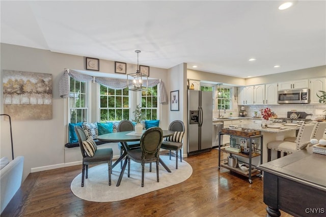 9607 Dunderry, Lysander, NY 13027 - dining area featuring dark wood-style flooring and recessed lighting