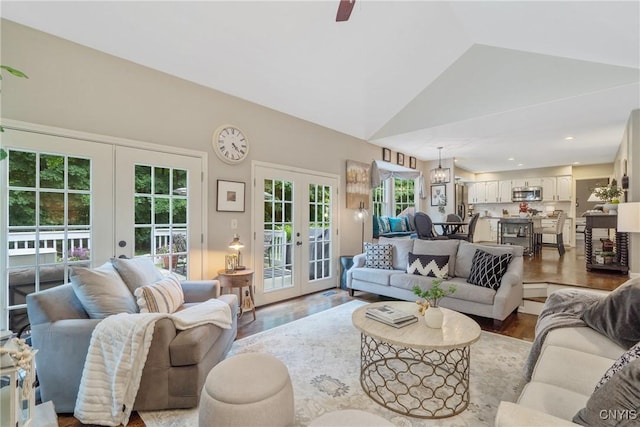 9607 Dunderry, Lysander, NY 13027 - living area with french doors, wood finished floors, lofted ceiling, ceiling fan, and recessed lighting
