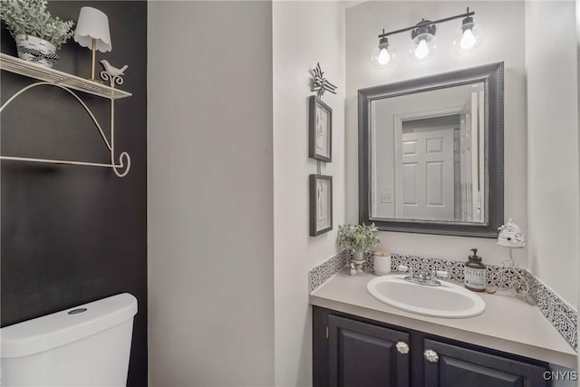 9607 Dunderry, Lysander, NY 13027 - half bathroom featuring toilet and vanity