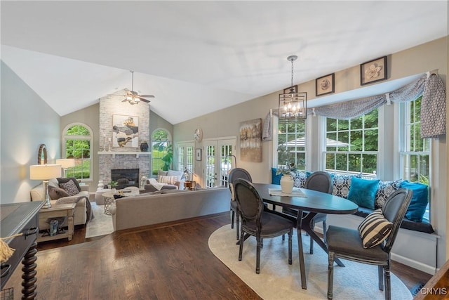 9607 Dunderry, Lysander, NY 13027 - dining space with ceiling fan, plenty of natural light, a fireplace, and vaulted ceiling