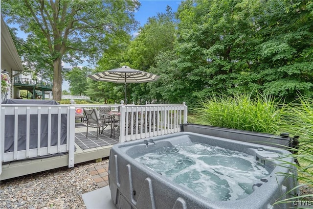 9607 Dunderry, Lysander, NY 13027 - deck featuring a hot tub and outdoor dining space