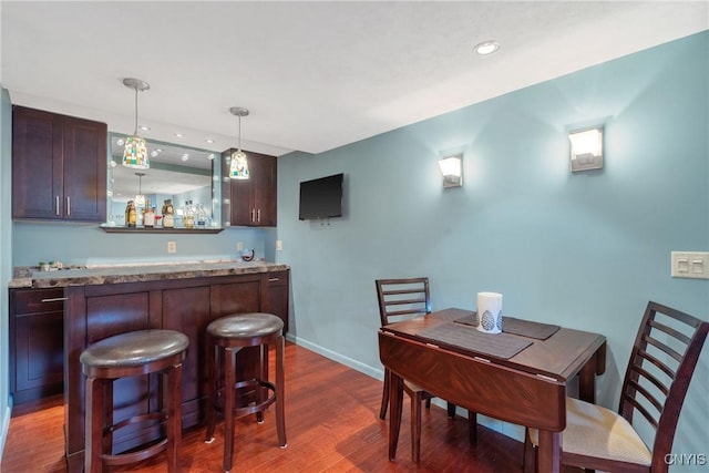 9607 Dunderry, Lysander, NY 13027 - indoor wet bar with dark wood-style floors, recessed lighting, and decorative light fixtures