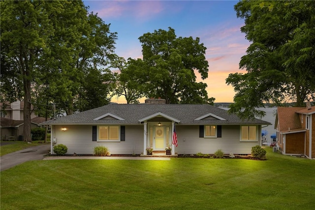 4969 Walnut Cove Dr, Canandaigua Town, NY 14424 - ranch-style home featuring a front lawn, a chimney, and a shingled roof