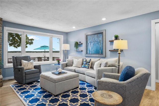 4969 Walnut Cove Dr, Canandaigua Town, NY 14424 - living room featuring wood finished floors and recessed lighting