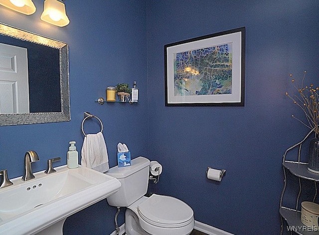 114 Slate Bottom Dr, Lancaster, NY 14043 - half bathroom with a sink and toilet