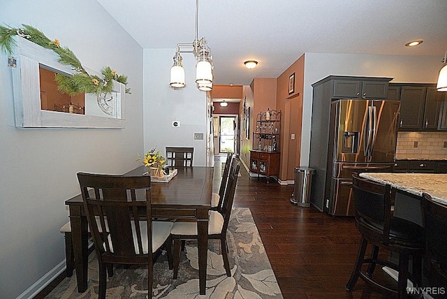 114 Slate Bottom Dr, Lancaster, NY 14043 - dining space with dark wood-style flooring and baseboards