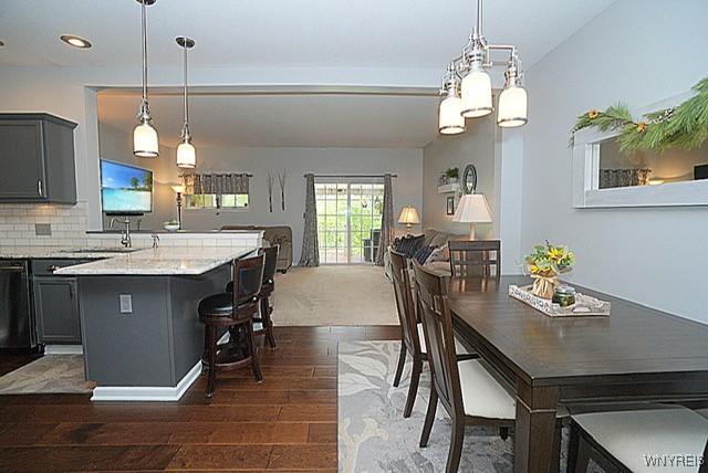 114 Slate Bottom Dr, Lancaster, NY 14043 - dining area featuring dark wood-style flooring and recessed lighting