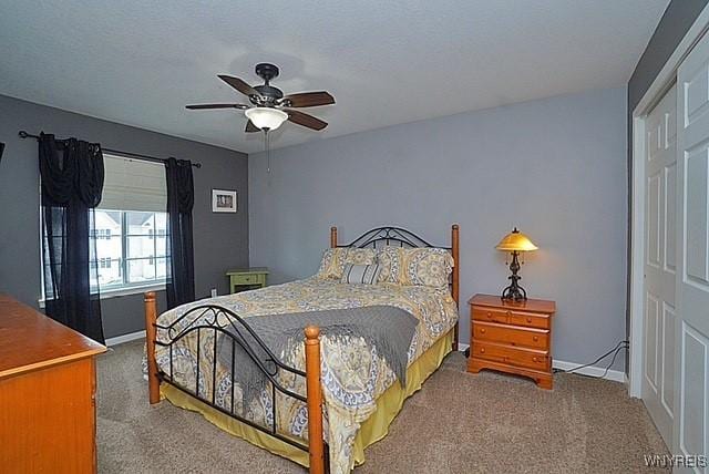 114 Slate Bottom Dr, Lancaster, NY 14043 - carpeted bedroom featuring baseboards and ceiling fan