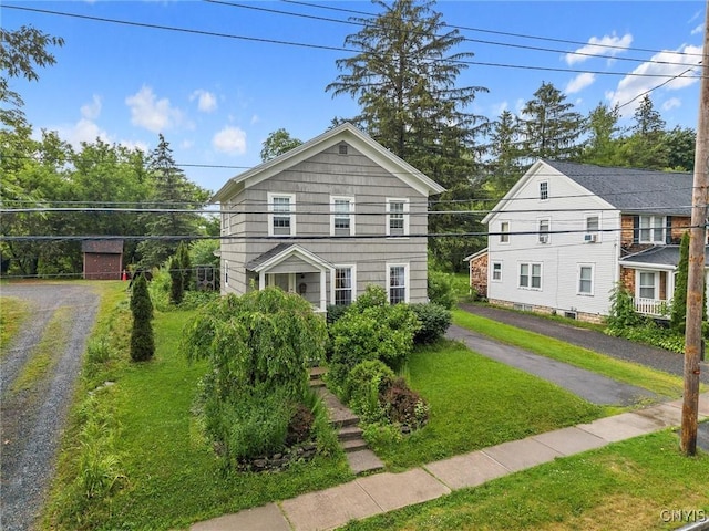 17 Burr St, Cazenovia, NY 13035 - view of front of house with a front lawn and driveway