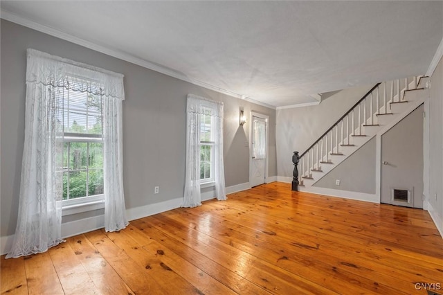 17 Burr St, Cazenovia, NY 13035 - foyer with stairway, hardwood / wood-style flooring, and crown molding