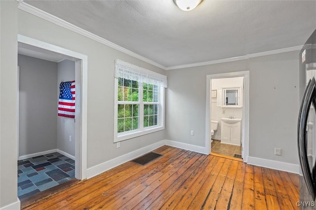 17 Burr St, Cazenovia, NY 13035 - washroom with wood-type flooring and ornamental molding