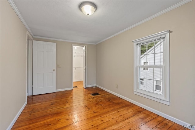 17 Burr St, Cazenovia, NY 13035 - unfurnished bedroom with light wood-style floors and crown molding