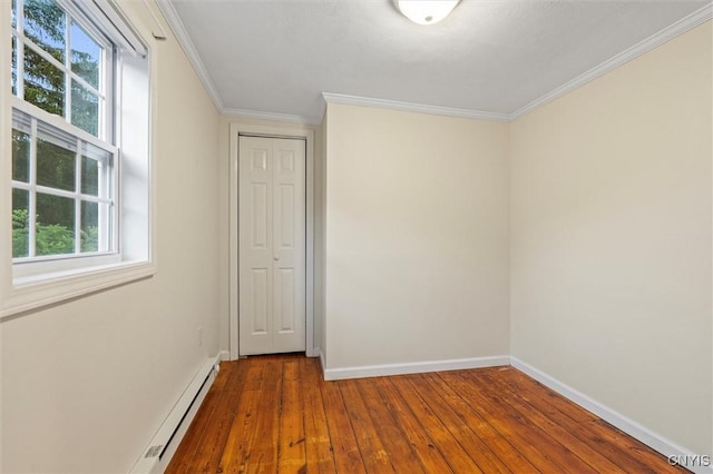 17 Burr St, Cazenovia, NY 13035 - spare room with a baseboard radiator, hardwood / wood-style flooring, plenty of natural light, and ornamental molding