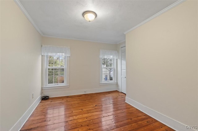 17 Burr St, Cazenovia, NY 13035 - spare room featuring ornamental molding and hardwood / wood-style flooring