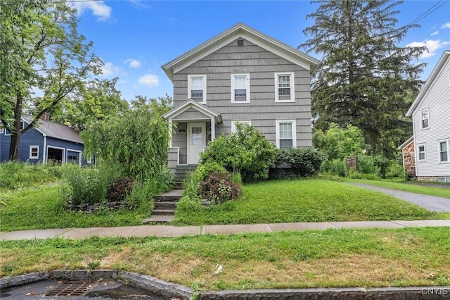 17 Burr St, Cazenovia, NY 13035 - view of front of house featuring a front lawn