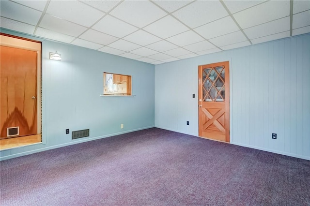 28 Berna Ln, Chili, NY 14624 - carpeted empty room featuring a paneled ceiling and baseboards