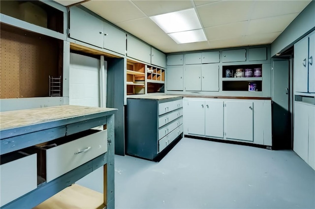 28 Berna Ln, Chili, NY 14624 - kitchen with open shelves, finished concrete floors, and a drop ceiling